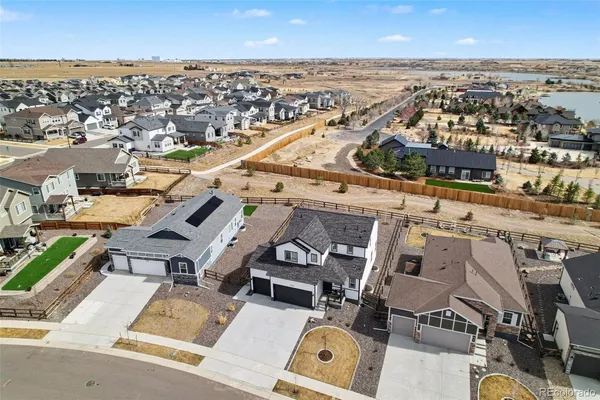 an aerial view of a city with lots of residential buildings
