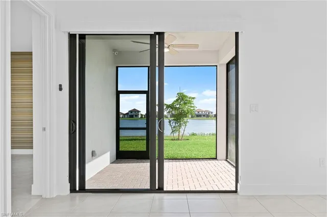 a view of porch with a door and chair