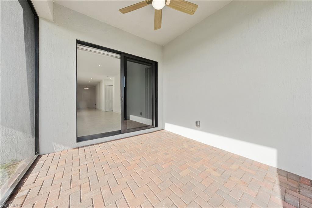 4947 Brigata Way Avenue Immokalee, FL 34142 - Photo 32 of 50 a view of an empty room with glass door
