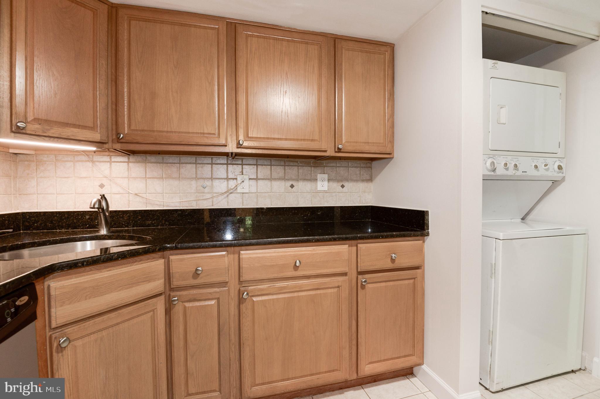 1411 Northgate Square, Unit 14111B Reston, VA 20190 - Photo 18 of 39 Granite counters w/backsplash