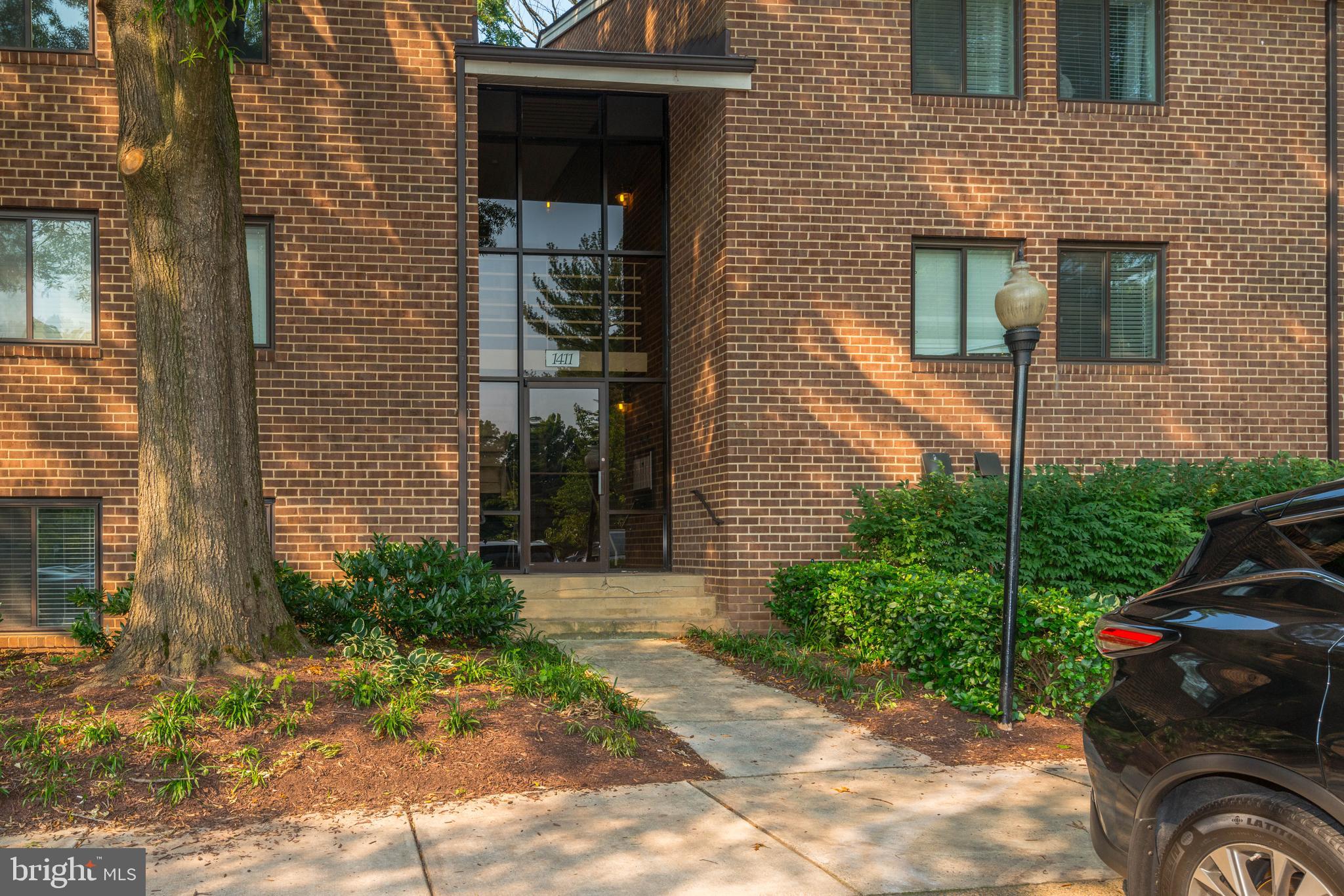 1411 Northgate Square, Unit 14111B Reston, VA 20190 - Photo 3 of 39 Front elevation of the building
