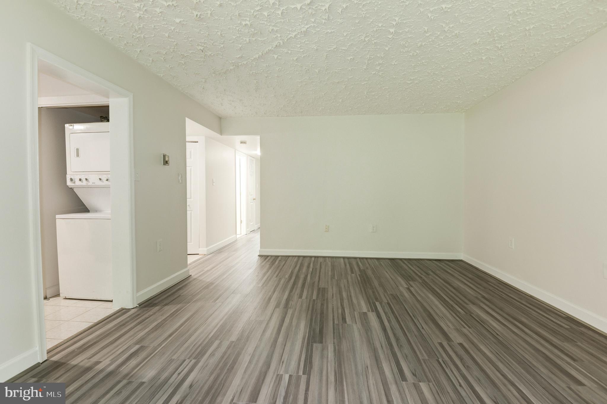 1411 Northgate Square, Unit 14111B Reston, VA 20190 - Photo 21 of 39 Living area draws to both the bedrooms