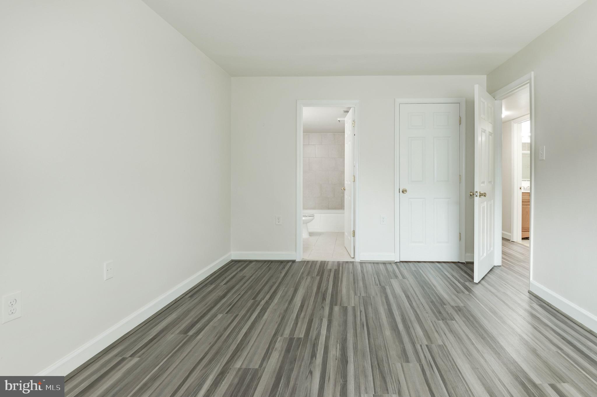 1411 Northgate Square, Unit 14111B Reston, VA 20190 - Photo 22 of 39 Primary bedroom; bedroom 1 of 2