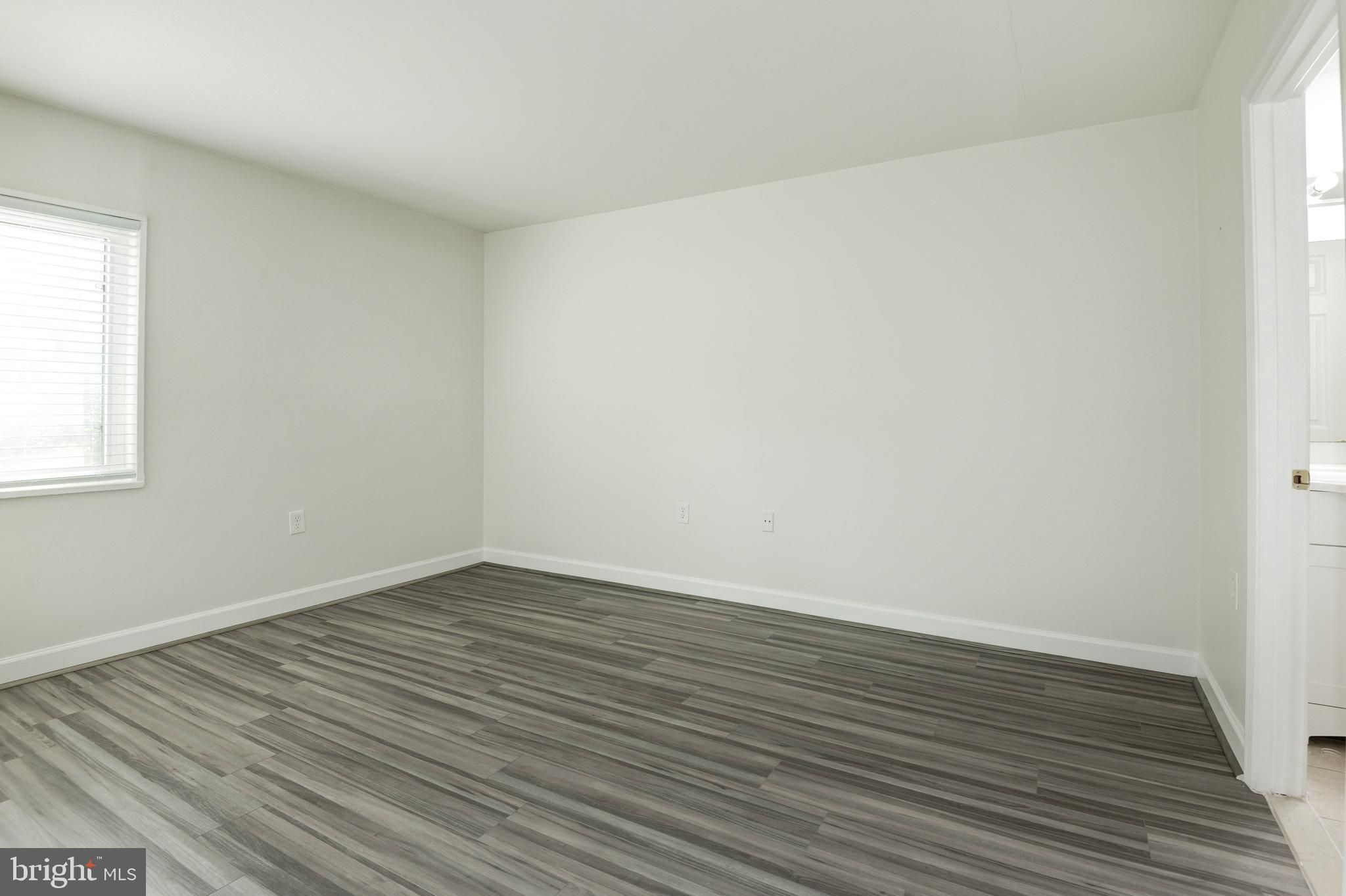 1411 Northgate Square, Unit 14111B Reston, VA 20190 - Photo 24 of 39 Primary bedroom; bedroom 1 of 2