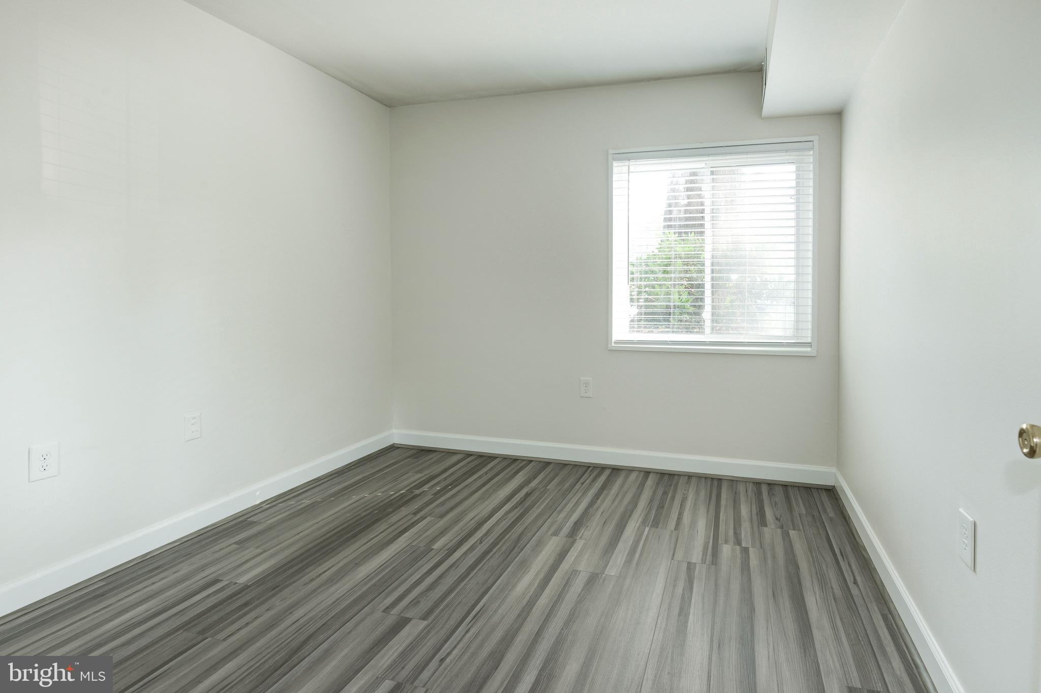 1411 Northgate Square, Unit 14111B Reston, VA 20190 - Photo 30 of 39 Hall bedroom; bedroom 2 of 2
