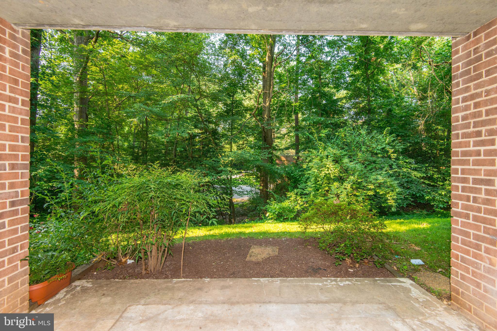 1411 Northgate Square, Unit 14111B Reston, VA 20190 - Photo 6 of 39 Patio backs to woods