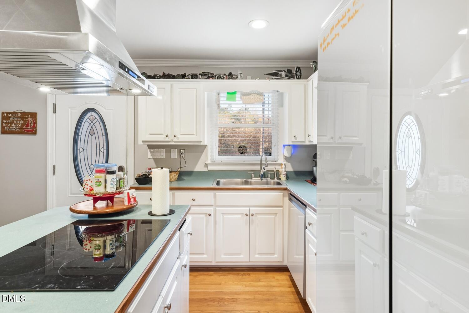2961 Wormranch Road Haw River, NC 27258 - Photo 14 of 27 a kitchen with stainless steel appliances granite countertop a stove a sink and a refrigerator