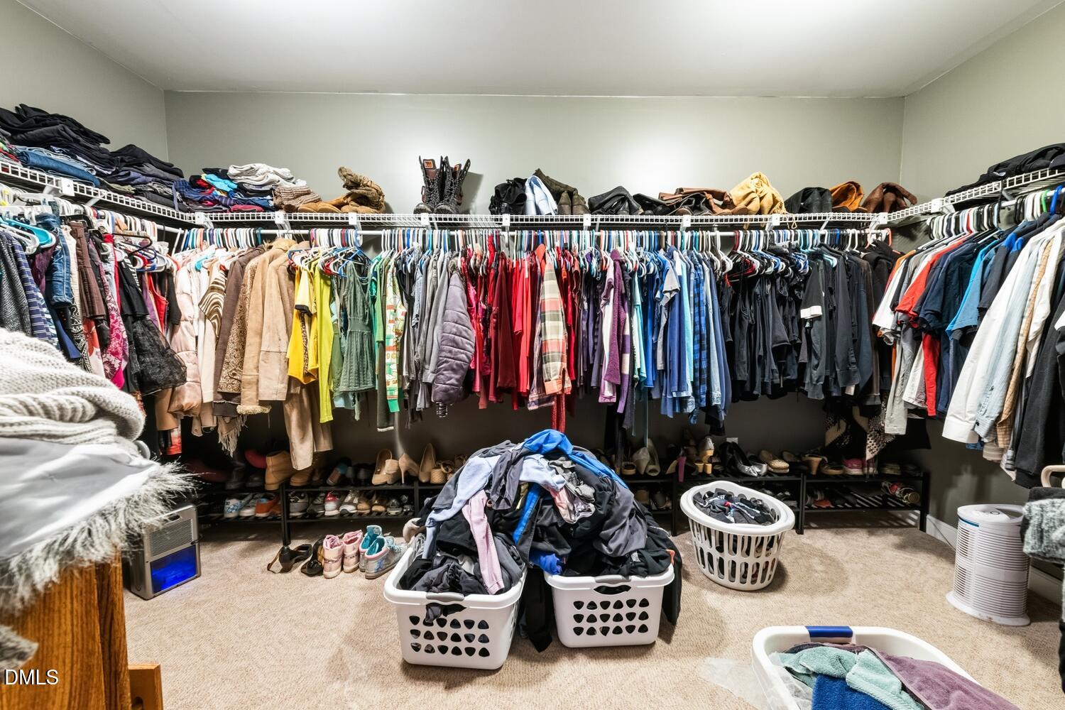 2961 Wormranch Road Haw River, NC 27258 - Photo 19 of 27 a view of walk in closet with clothes