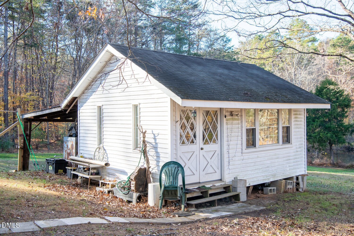 2961 Wormranch Road Haw River, NC 27258 - Photo 25 of 27 a view of a house with a yard and sitting area