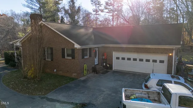 a view of backyard with outdoor seating