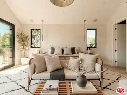 a bathroom with sink and mirror