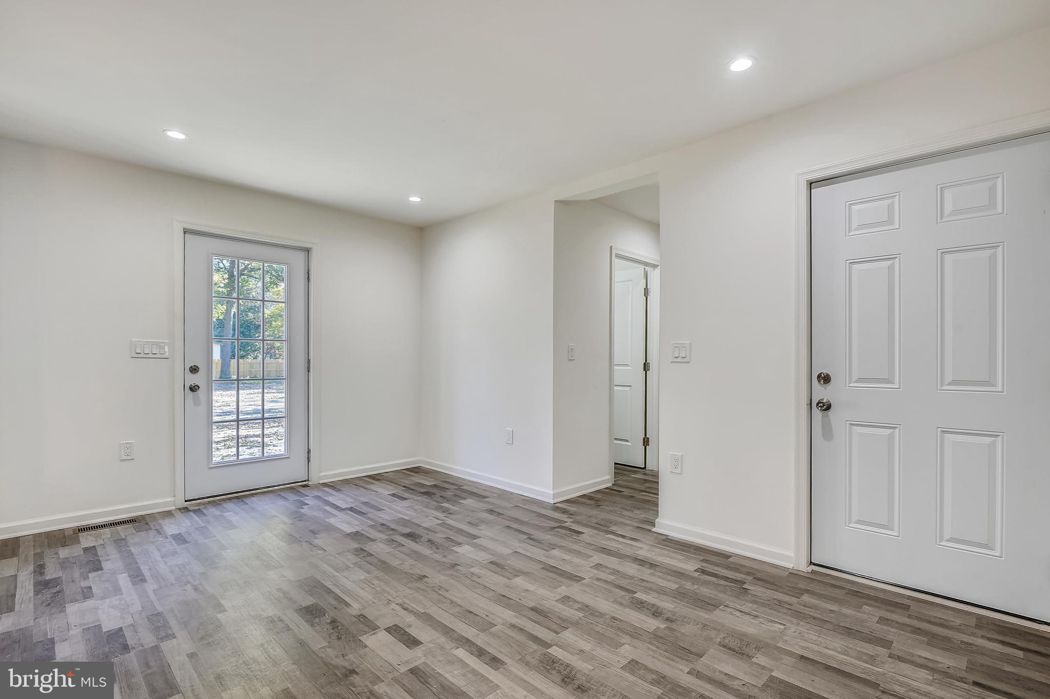 204 Park Avenue Ridgely, MD 21660 - Photo 13 of 52 Dining area with door to backyard