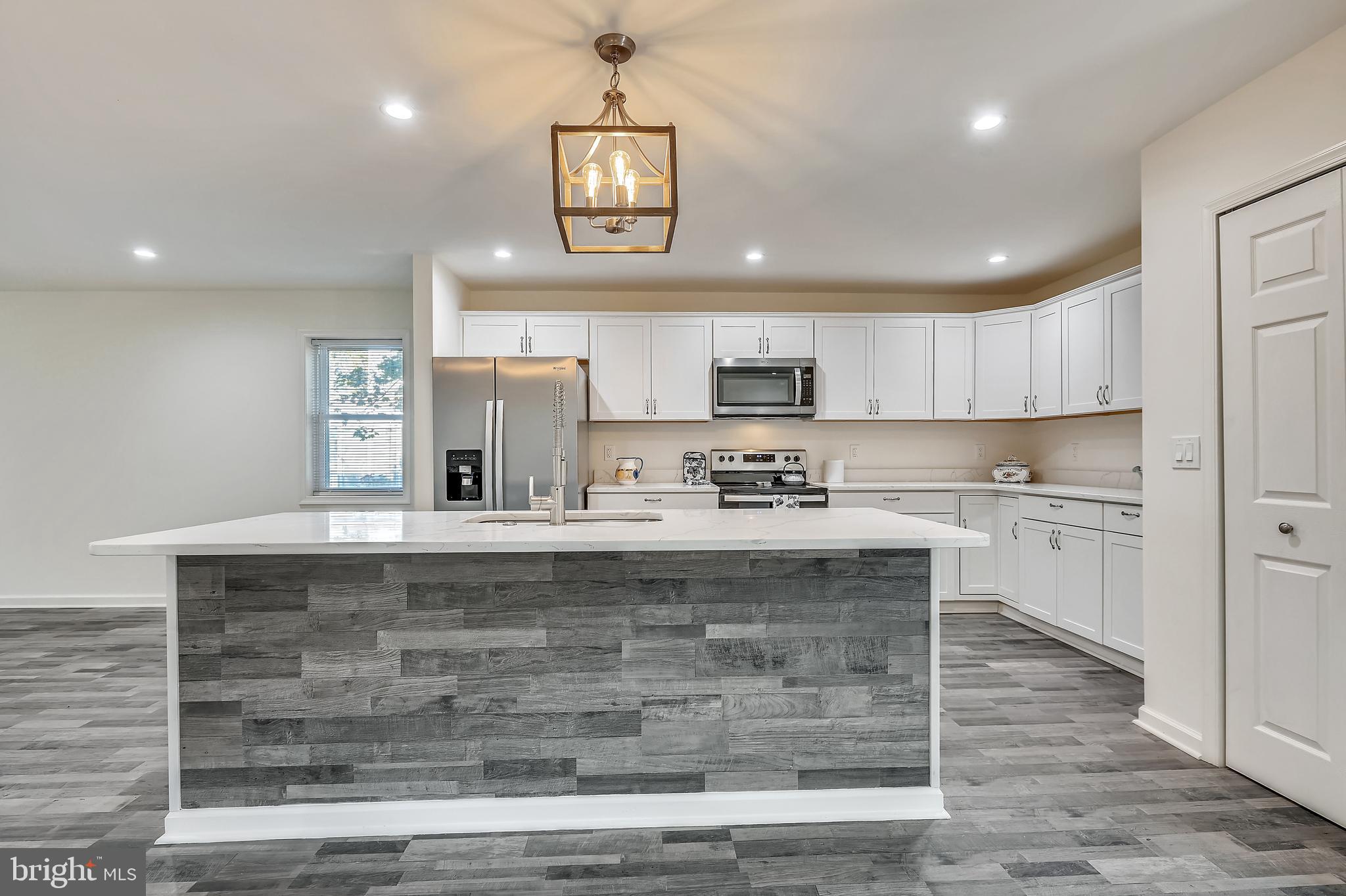 204 Park Avenue Ridgely, MD 21660 - Photo 16 of 52 Large kitchen island from dining area