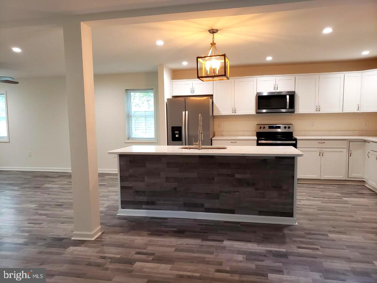 204 Park Avenue Ridgely, MD 21660 - Photo 17 of 52 View showing island and LR from DR
