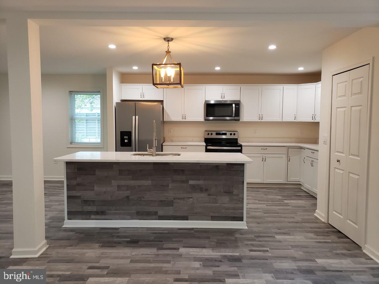 204 Park Avenue Ridgely, MD 21660 - Photo 23 of 52 From dining area into kitchen, pantry on right
