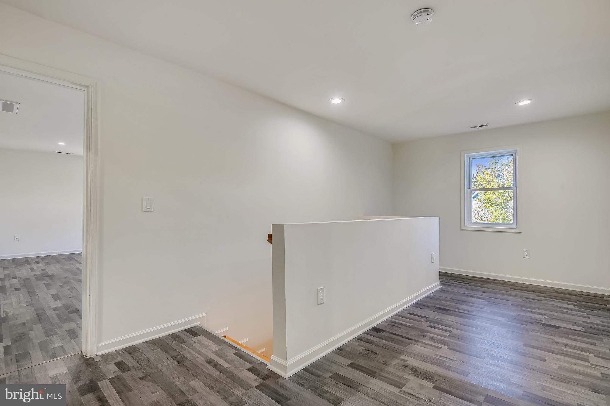 204 Park Avenue Ridgely, MD 21660 - Photo 35 of 52 Common area and stairs to main level