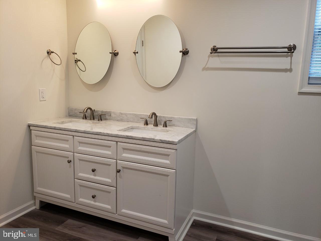 204 Park Avenue Ridgely, MD 21660 - Photo 47 of 52 Owner's lovely two-sink vanity w/moveable mirrors