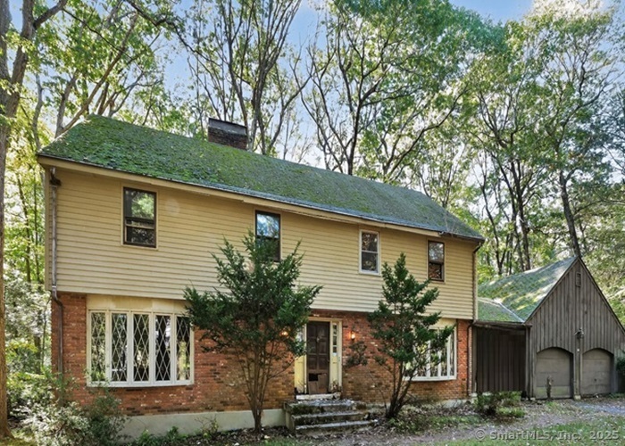 51 Charing Cross Avon, CT 06001 - Photo 1 of 1 a front view of house with yard and trees around