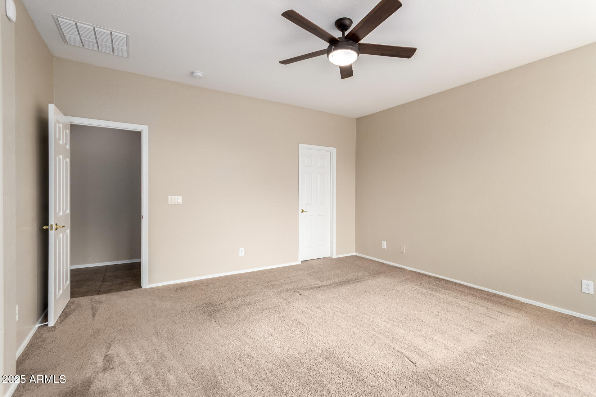 2203 West Vía Caballo Blanco Phoenix, AZ 85085 - Photo 17 of 28 a view of a big room with carpet