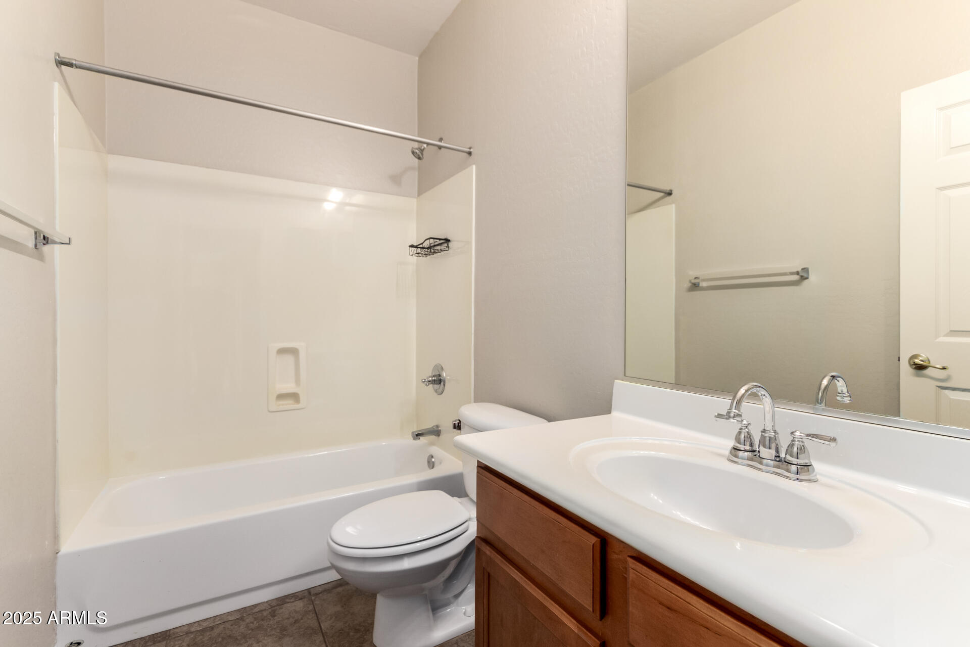 2203 West Vía Caballo Blanco Phoenix, AZ 85085 - Photo 25 of 28 a bathroom with a sink a toilet and shower