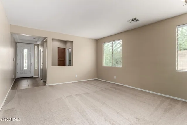 an empty room with windows