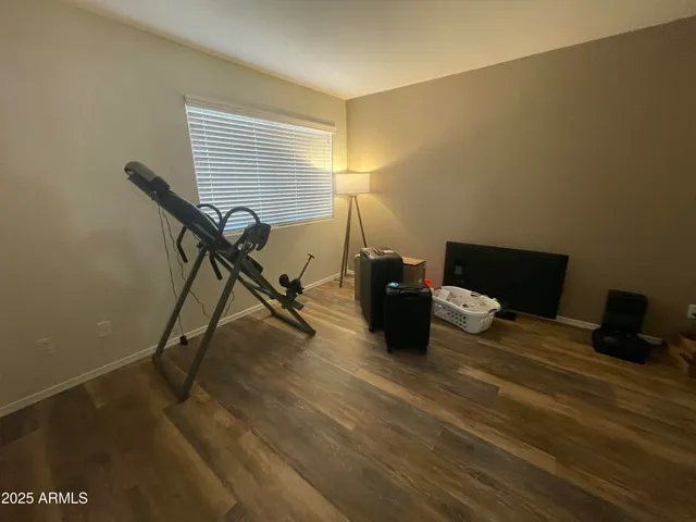 a bed room with furniture and a window