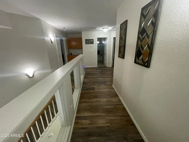 a view of hallway with stairs