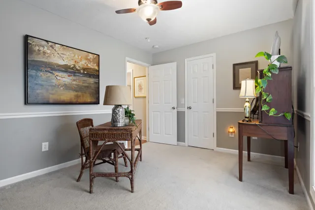 a view of a workspace with furniture