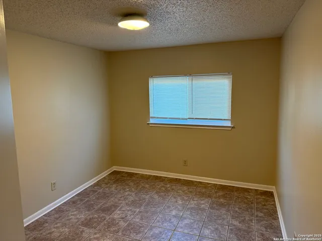 an empty room with a natural light