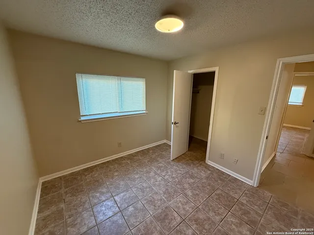 an empty room with an empty door