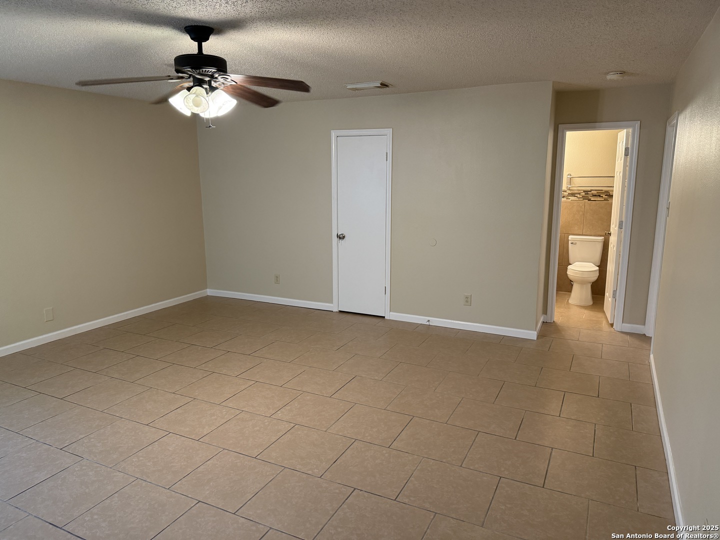 8015 Chestnut Gate Lane Converse, TX 78109 - Photo 7 of 21 a view of a livingroom with a chandelier fan