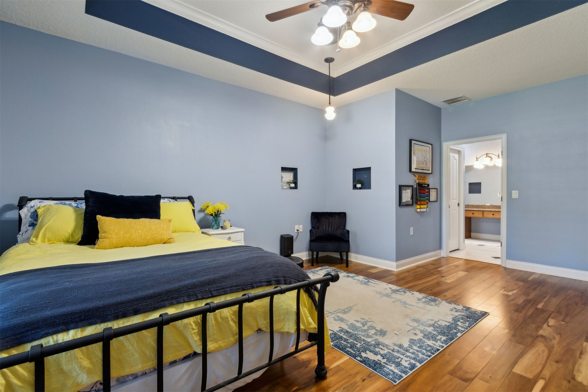 87377 Raddin Road Yulee, FL 32097 - Photo 45 of 75 a bedroom with a bed and a table in it