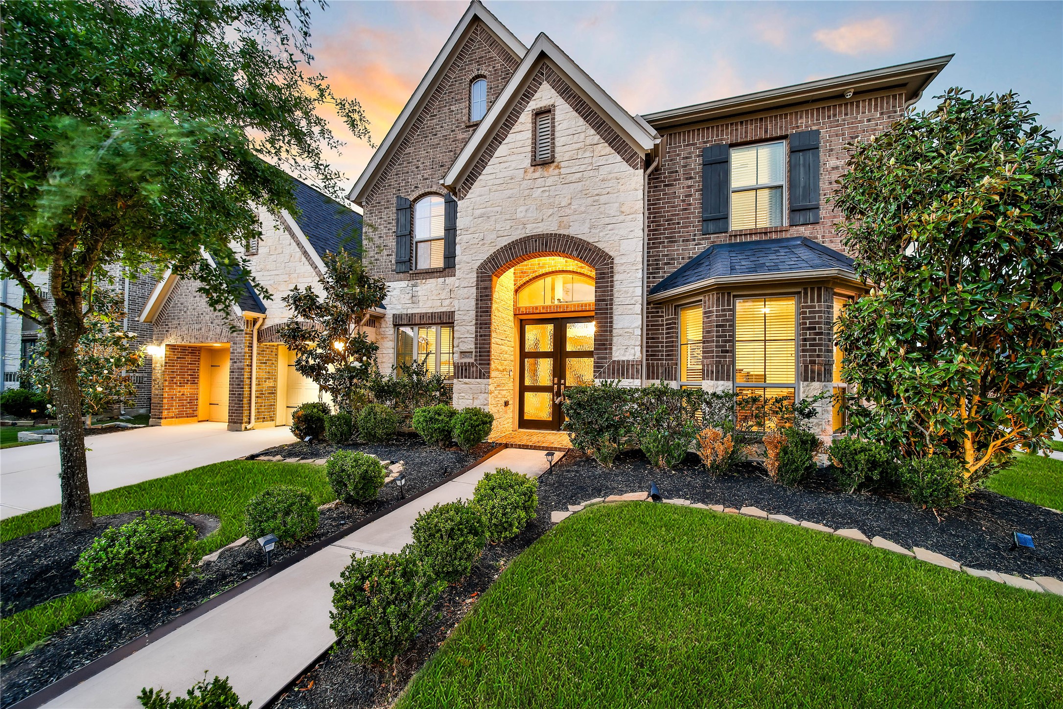 28602 Mountain Timber Court Fulshear, TX 77441 - Photo 3 of 47 Welcome to 28602 Mountain Timber Ct. This stunning Perry home sits on a premium 65ft corner/culdesac lot!
