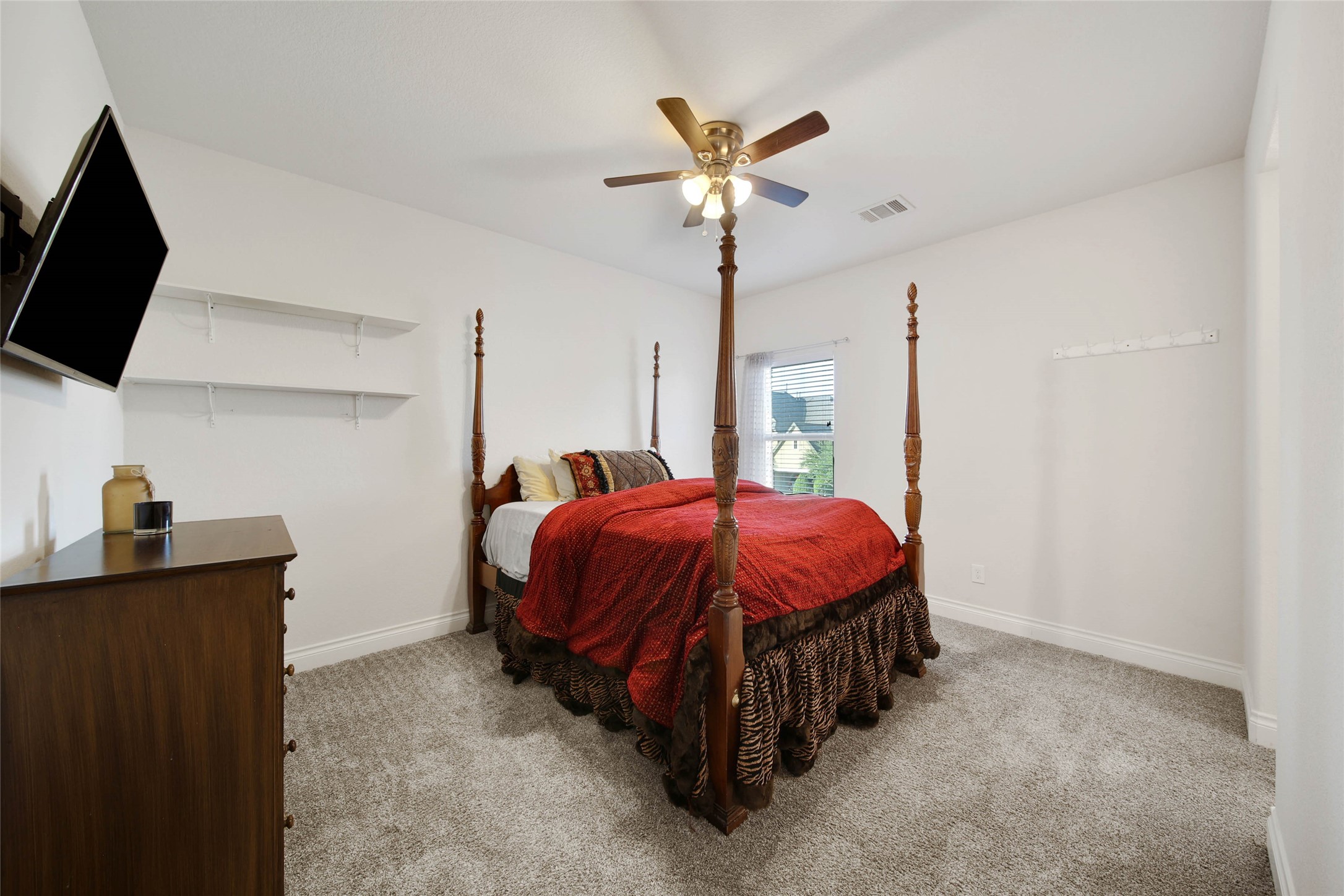 28602 Mountain Timber Court Fulshear, TX 77441 - Photo 33 of 47 All bedrooms feature a neutral palette, providing a versatile backdrop ready to be designed to your personal style.