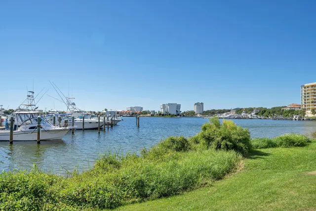 a view of a lake with houses with outdoor space