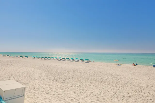 a view of a lake with a beach