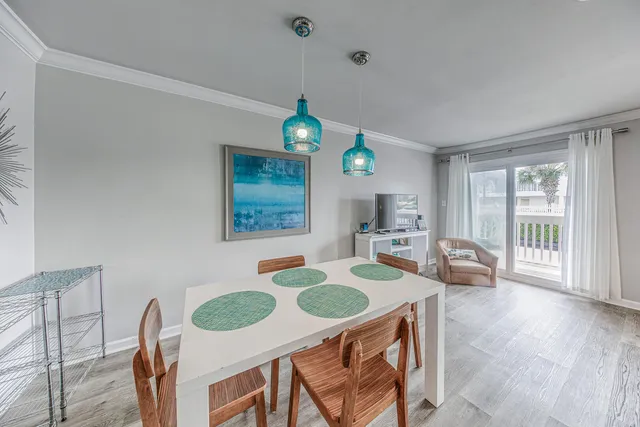 a view of a dining room with furniture