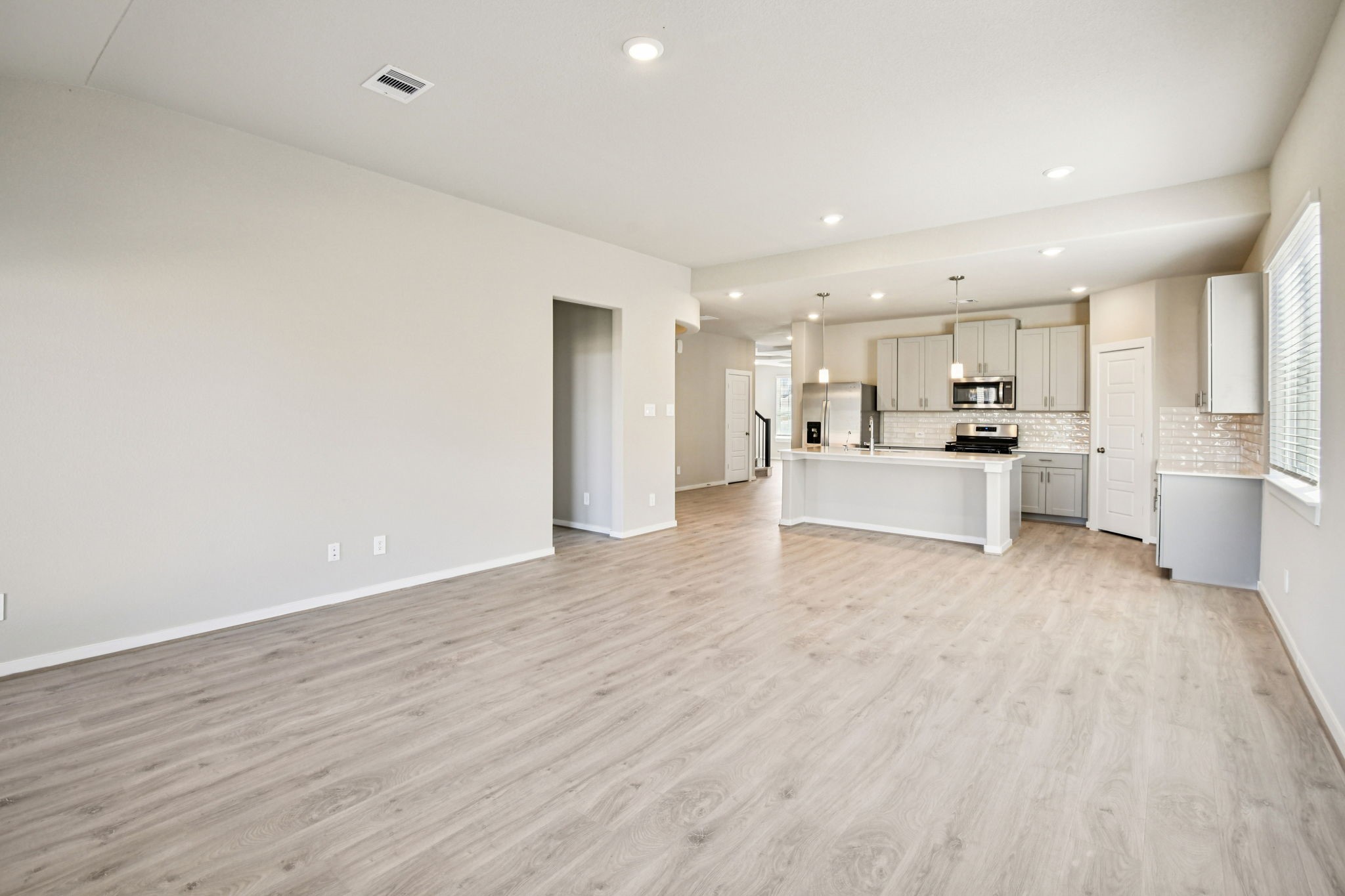 17892 Stone Terrace Montgomery, TX 77316 - Photo 11 of 49 a view of kitchen with wooden floor