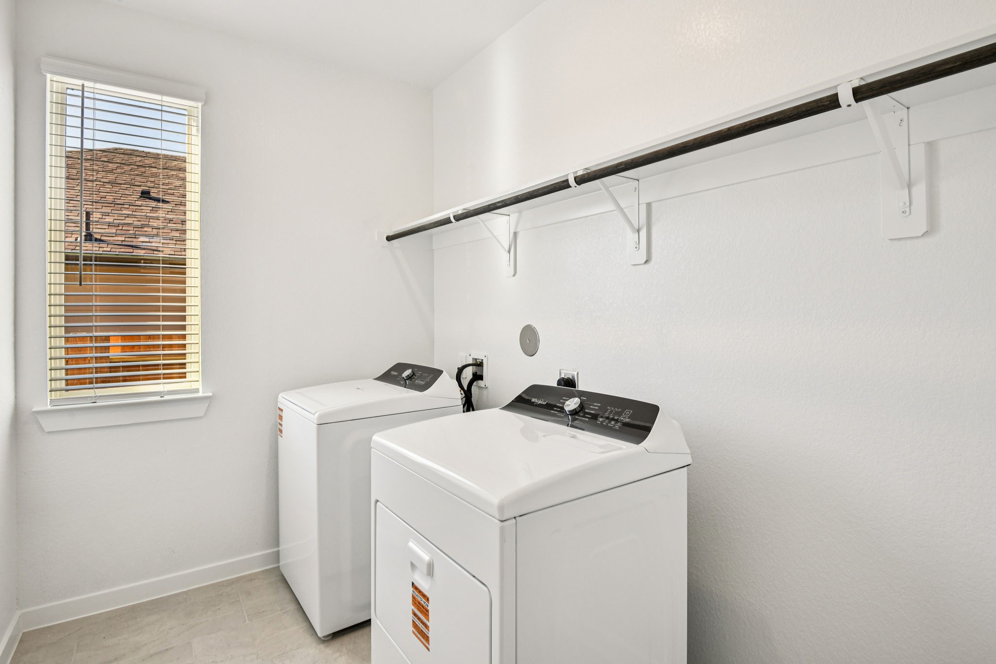 17892 Stone Terrace Montgomery, TX 77316 - Photo 19 of 49 a utility room with dryer and washer