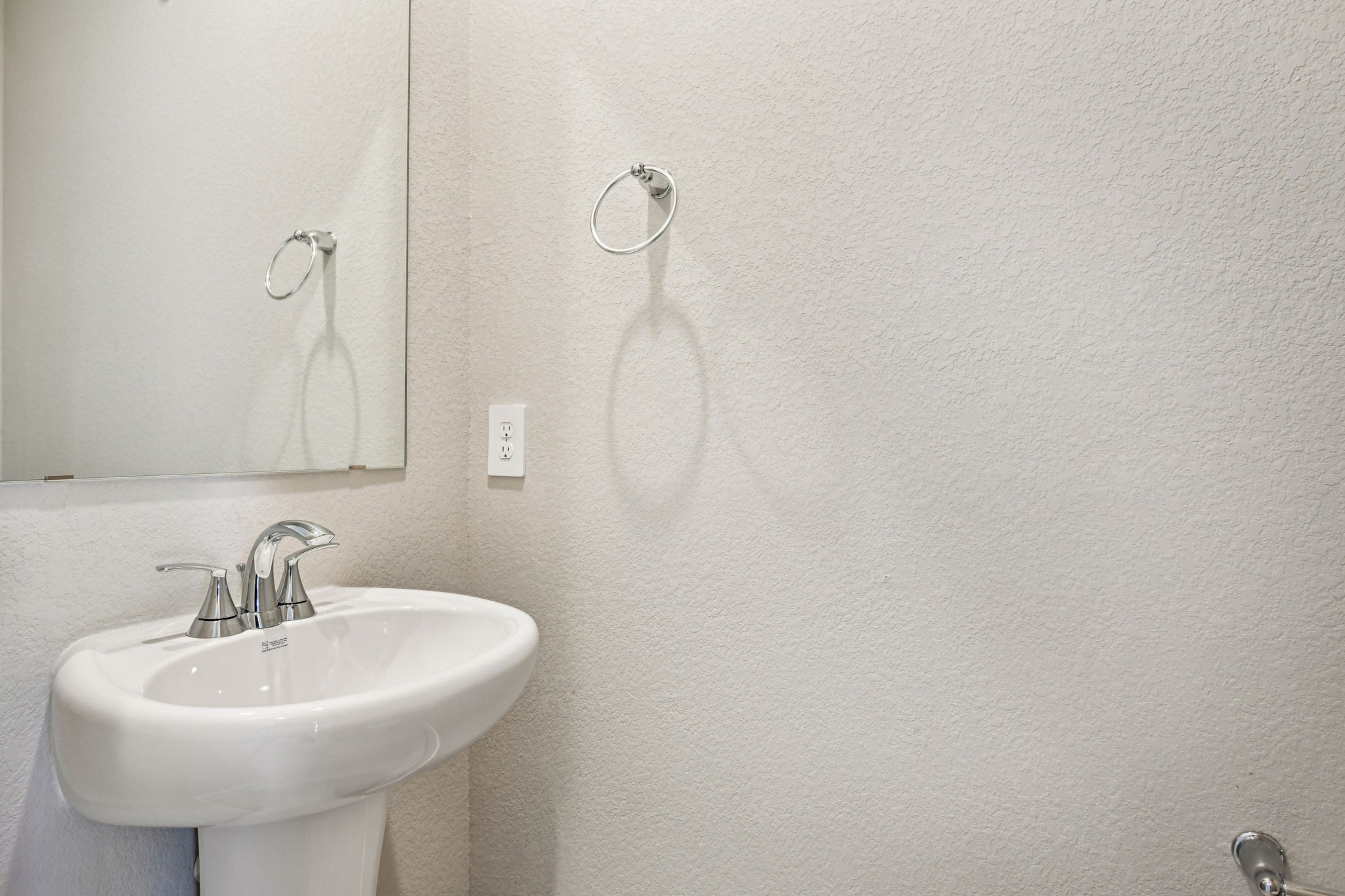 17892 Stone Terrace Montgomery, TX 77316 - Photo 20 of 49 a bathroom with a sink a mirror and shower