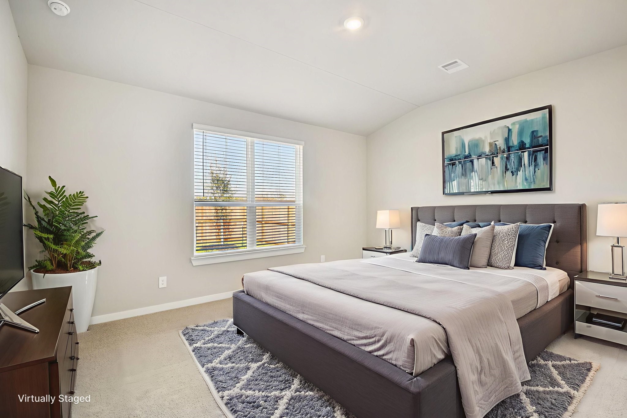 17892 Stone Terrace Montgomery, TX 77316 - Photo 22 of 49 a bedroom with a bed and a potted plant on a dresser