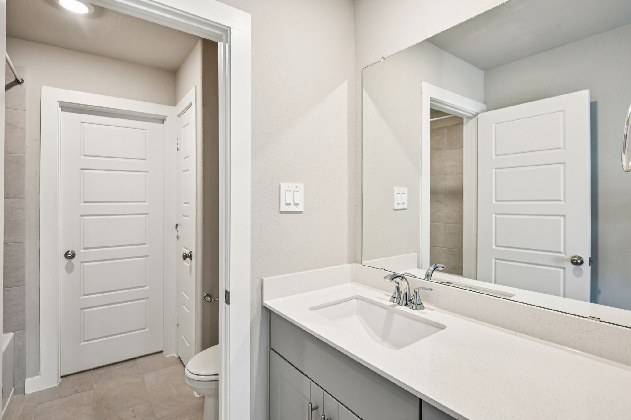 17892 Stone Terrace Montgomery, TX 77316 - Photo 42 of 49 a bathroom with a sink and a mirror