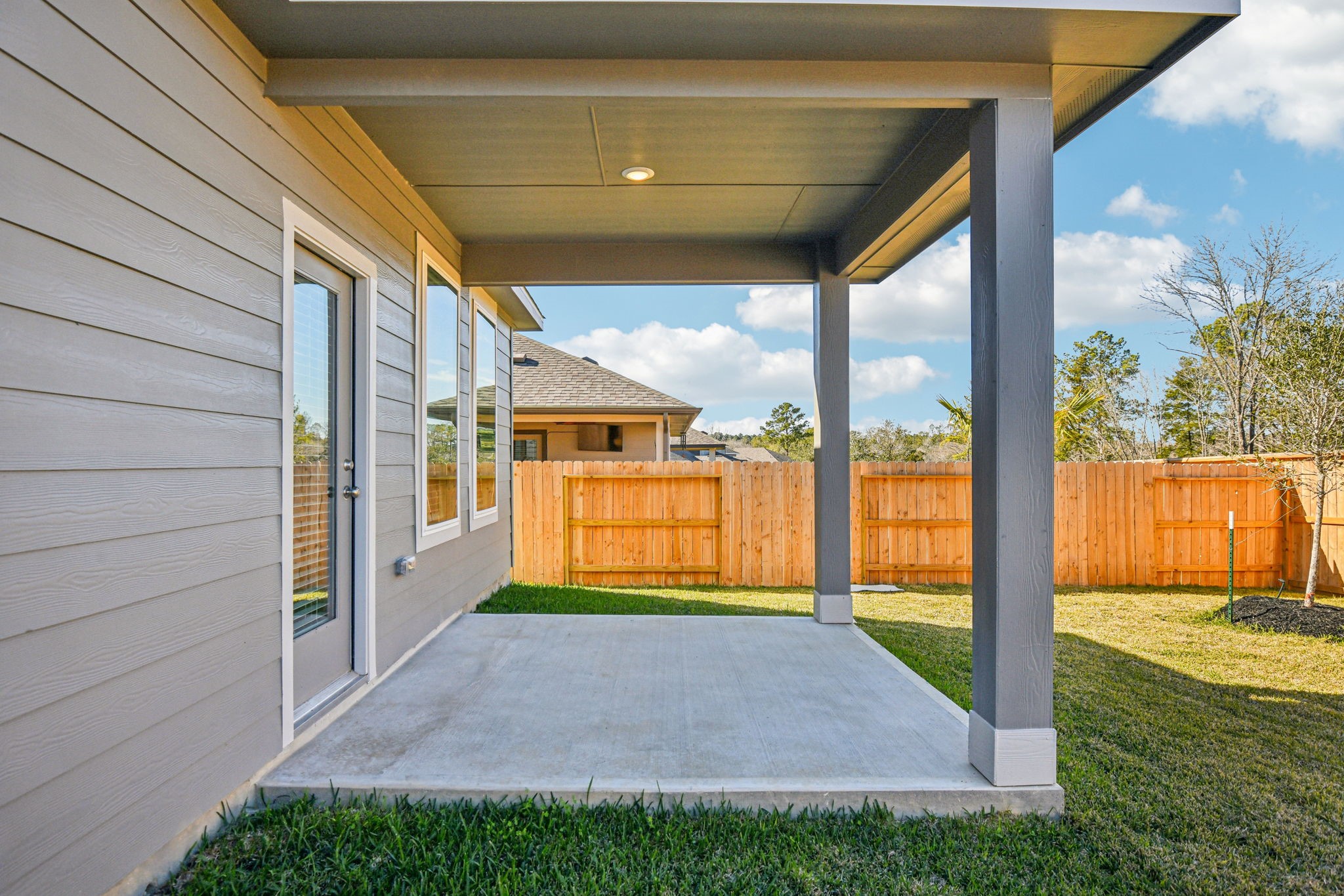 17892 Stone Terrace Montgomery, TX 77316 - Photo 47 of 49 a view of porch with a backyard