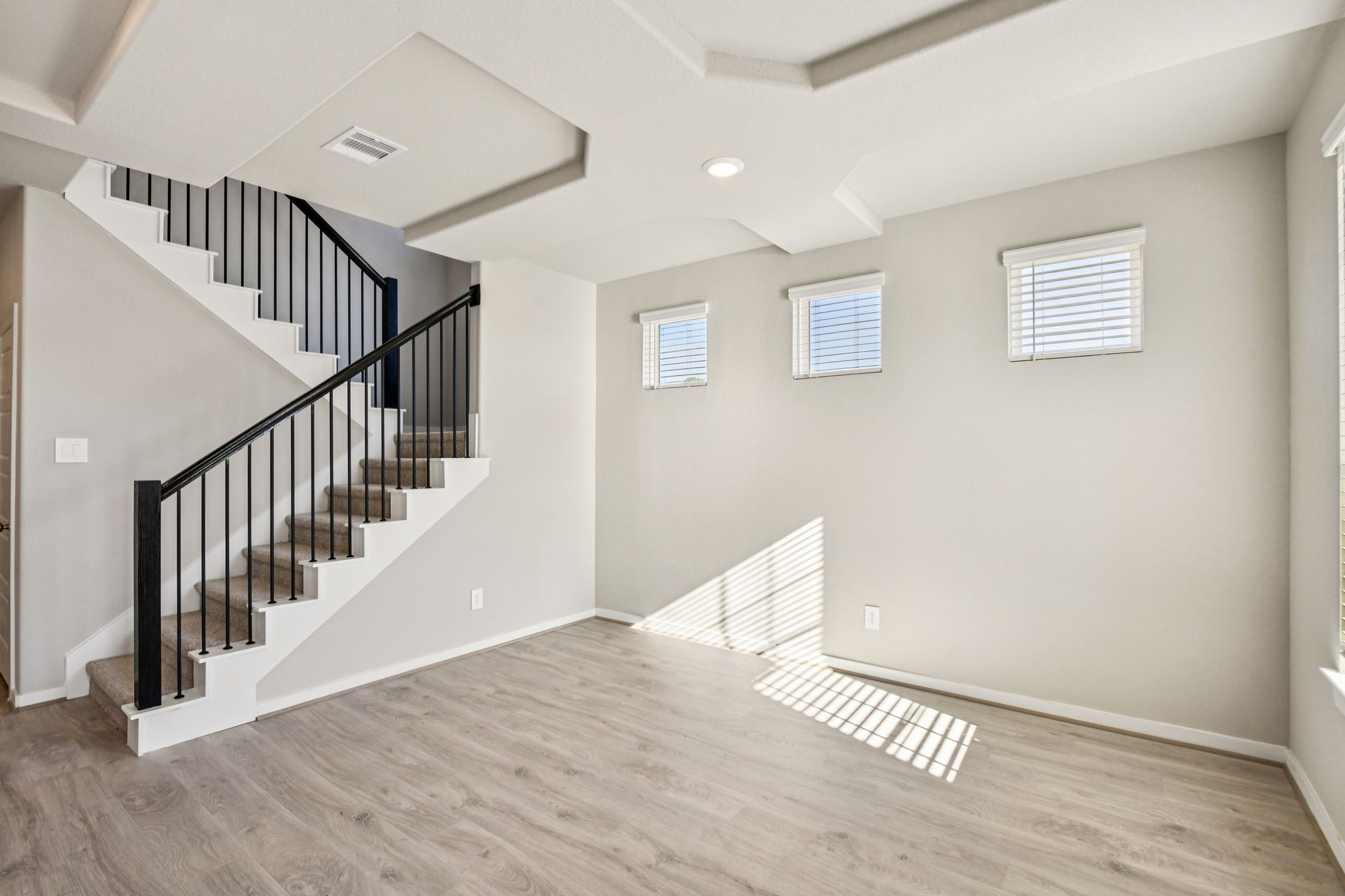17892 Stone Terrace Montgomery, TX 77316 - Photo 6 of 49 a view of staircase with wooden floor and white walls
