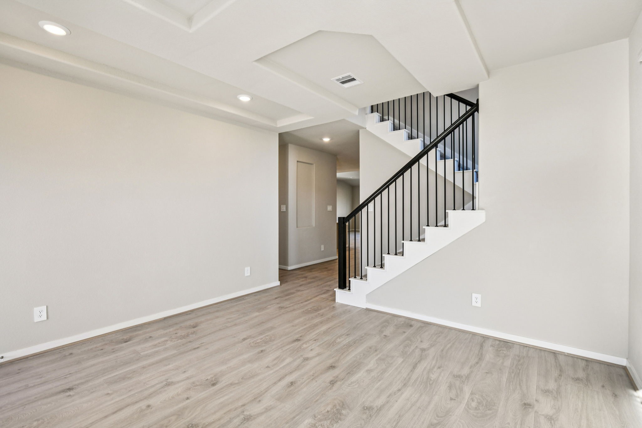 17892 Stone Terrace Montgomery, TX 77316 - Photo 7 of 49 a view of entryway with wooden floor