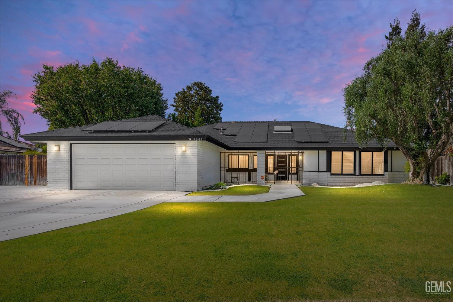 a view of a swimming pool with an outdoor space and seating area