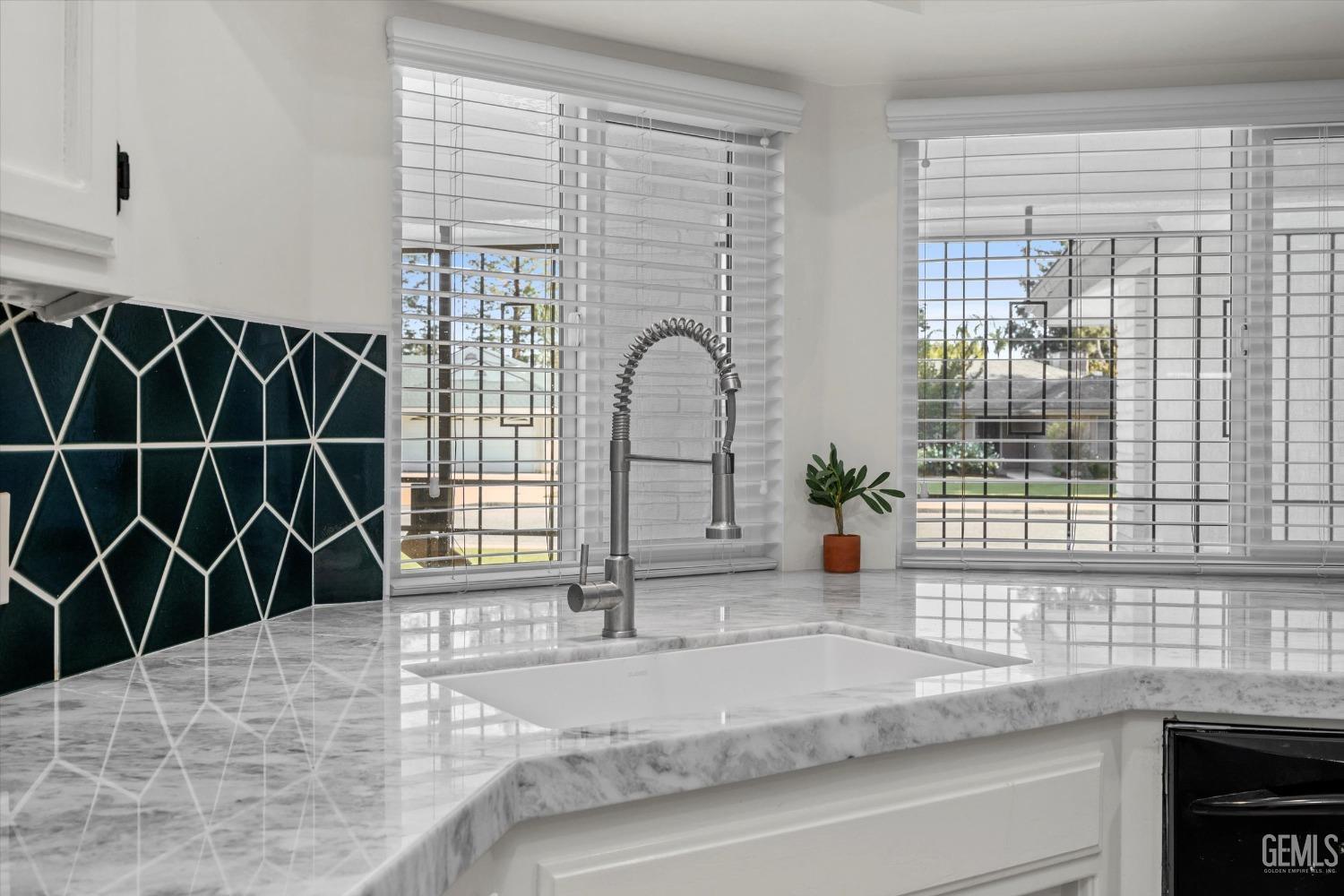 Undisclosed Address Bakersfield, CA 93311 - Photo 18 of 34 a black and white photo of a house