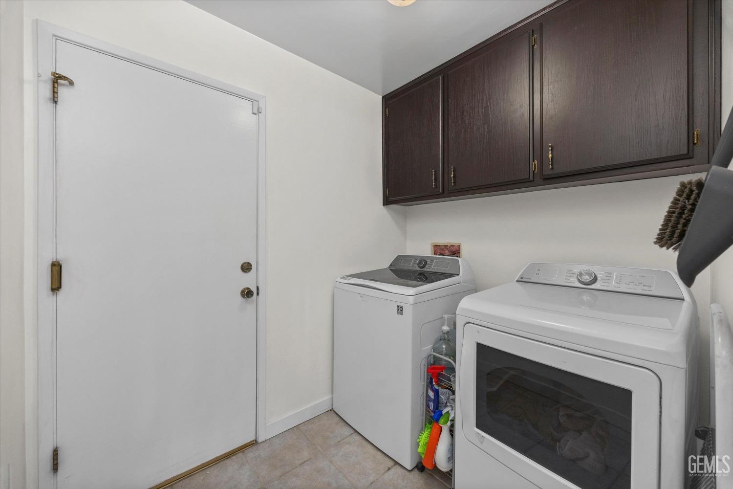 Undisclosed Address Bakersfield, CA 93311 - Photo 28 of 34 a utility room with dryer and washer