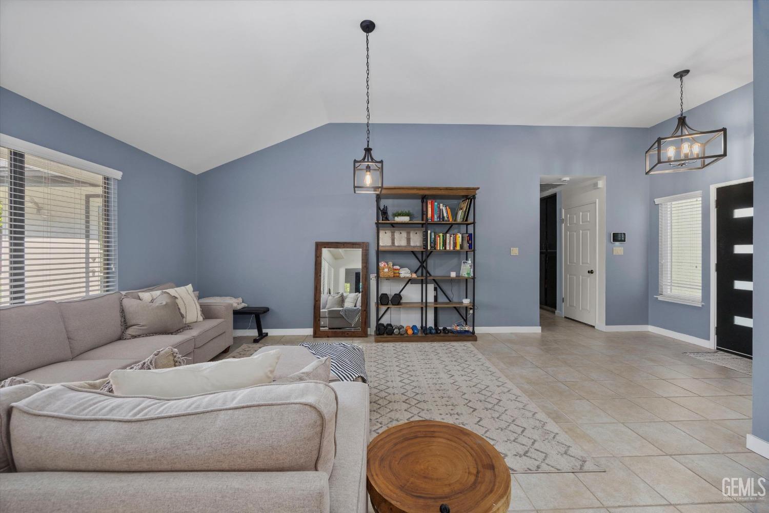 Undisclosed Address Bakersfield, CA 93311 - Photo 8 of 34 a living room with furniture and a window