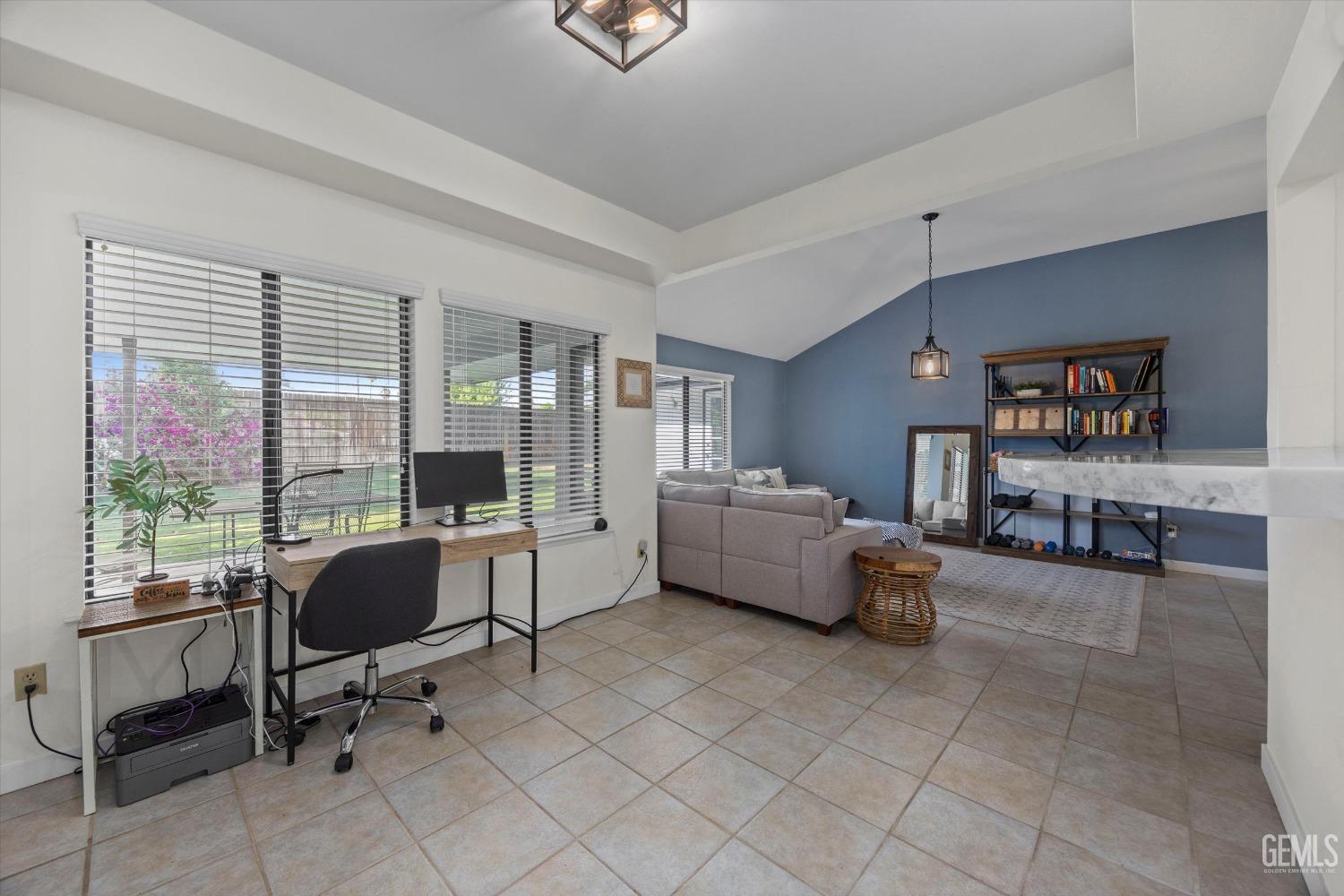 Undisclosed Address Bakersfield, CA 93311 - Photo 9 of 34 a living room with furniture and a large window